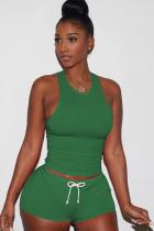 Зеленый вязаный сексуальный лоскутный костюм из двух предметов, однотонный, прямой, без рукавов, короткий комплект из двух предметов