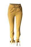 Pantalones pitillo asimétricos con lazo y lazo liso alto con bragueta elástica verde