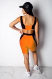 オレンジのセクシーなファッションカジュアルクロップトップパッチワーク幾何学スキニーツーピースショートセット