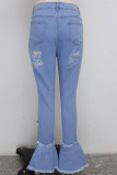 Pantaloni in denim azzurro con bottoni senza maniche con patchwork alto, buco solido, con taglio a stivale