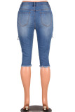 Синие джинсовые брюки-капри с застежкой-молнией средней длины и сплошным отверстием для стирки карандаш