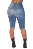 Синие джинсовые брюки-капри с застежкой-молнией средней длины и сплошным отверстием для стирки карандаш