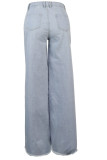Pantalones sueltos asimétricos de agujero alto con cremallera de mezclilla blanca