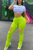 Pantalones con corte de bota y agujero sólido medio con cordón verde fluorescente