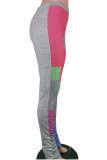 Roze elastische broek met hoge split en skinny broek