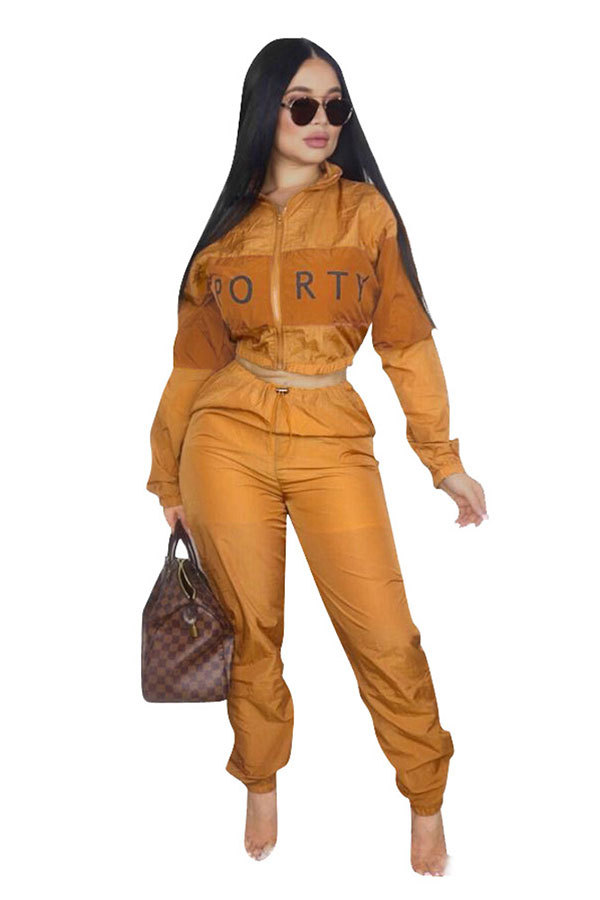 Oranje elastische rechte broek met lange mouwen, patchwork en middenletter