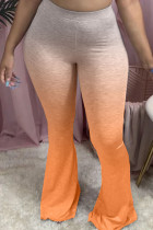 Оранжевые эластичные брюки средней длины с градиентным принтом Fly Fly