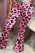 Roze elastische middenbroek met luipaardprint en bootcut broek