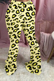 Pantalones con corte de bota y estampado de leopardo medio con bragueta elástica rosa