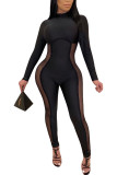 Zwarte mode sexy effen jumpsuit met lange mouwen en coltrui