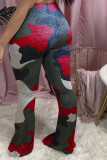 Pantaloni con taglio a stivale mimetico con stampa alta elastica verde