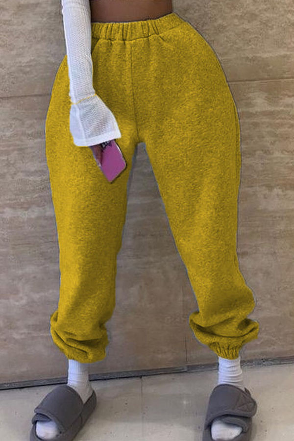 Pantalon Harlan élastique jaune mi-haut uni