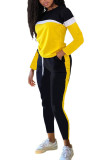 Gelbe modische Sportbekleidung für Erwachsene, Patchwork, solides Patchwork, O-Ausschnitt, lange Ärmel, normale Ärmel, normale Zweiteile