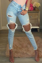 Calça jeans skinny casual com botões rasgados e cintura alta azul bebê