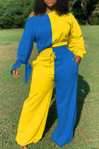 黄色と青のファッションカジュアルパッチワーク固体パッチワークパンツ結び目バトーネック長袖レギュラースリーブレギュラー XNUMX ピース
