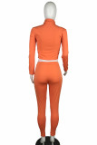 Abbigliamento sportivo casual arancione Misto spandex Patchwork Pantaloni patchwork solidi Colletto con cerniera Manica lunga Manica normale Corta Due pezzi