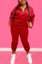 Roter Sportswear-Zweiteiler mit festem Kordelzug und Reißverschlusskragen, langen Ärmeln und regulären Ärmeln