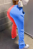 Pantalones regulares de patchwork liso diario rojo y azul