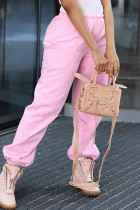 Pantaloni casual in tinta unita rosa