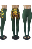 Зеленые и желтые узкие брюки с сексуальным принтом