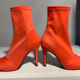 オレンジ色のファッションカジュアルくり抜かれた丸い靴