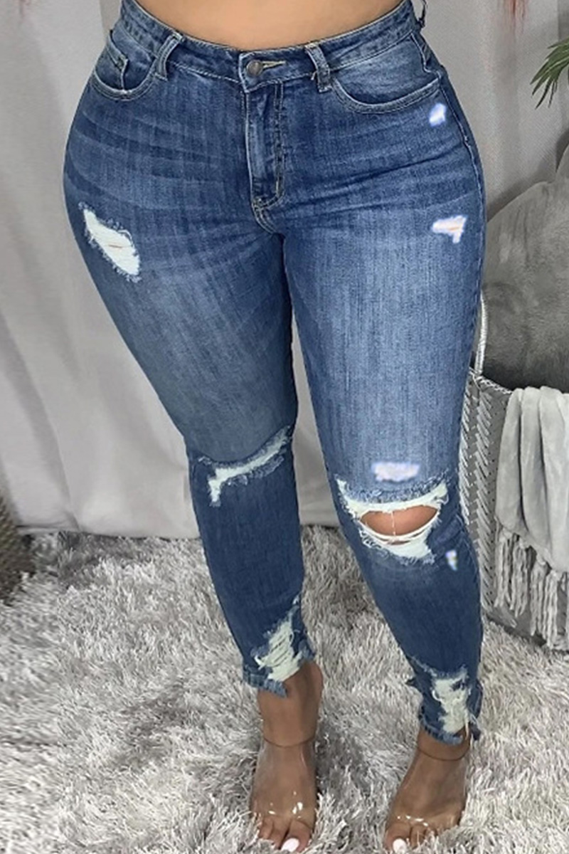 dark blue ripped jeans