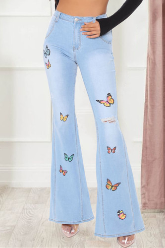 Jeans azul bebê moda casual com estampa de borboletas rasgada e cintura média