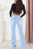 Babyblauwe mode casual vlinderprint gescheurde mid waist boot cut jeans