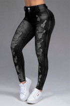 Calça jeans skinny preta fashion casual sólida rasgada cintura média