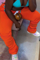 Оранжевые повседневные однотонные брюки-карандаш со средней посадкой со средней посадкой и небольшими эластичными складками