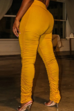 Pantalones de altavoz de cintura alta ajustados con pliegues sólidos casuales amarillos