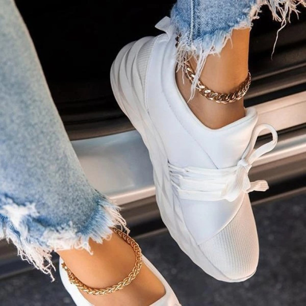 Sneakers traspiranti in tinta unita casual moda bianca