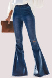 Jeans Sky Blue Street com rasgos e cintura alta com corte de bota