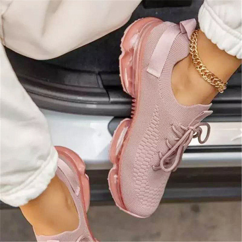 Scarpe sportive in tinta unita rosa per abbigliamento sportivo casual