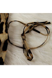 Gelber, sexy Leopardenkornverband mit langen Ärmeln und Umlegekragen