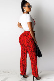 Pantalones sueltos con estampado de patchwork medio y cordón rojo Pantalones