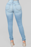 Pantalones de mezclilla azul con botones y bragueta sin mangas con patchwork a media pierna y lápiz liso