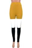 Pantaloni skinny patchwork medio senza maniche con volant elastico giallo
