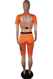 Оранжевый модный сексуальный короткий комплект из двух предметов с открытой спиной и лоскутным принтом, прямой короткий рукав