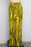 Pantalones sueltos con estampado de patchwork medio y cordón amarillo Pantalones