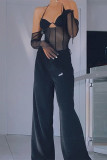 Schwarze Mode Sexy Patchwork Solide durchsichtige rückenfreie Neckholder-Tops