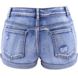 Lichtblauwe mode casual effen gescheurde midden taille jeans (zonder riem)
