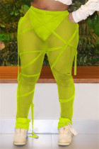 Pantalones de cintura media regulares transparentes con cordón de dibujo sólido sexy de moda verde fluorescente