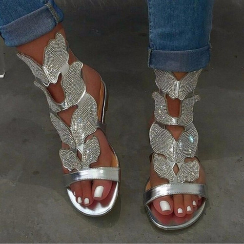 Sandali da porta con bocca di pesce a forma di pesce in argento scavato alla moda