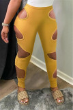 Yellow Sexy Casual Solid Hollowed Out Skinny High Waist Pencil Trousers