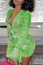 Grünes, sexy bedrucktes Kleid mit Kordelzug und V-Ausschnitt