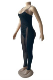Zwarte mode sexy patchwork doorschijnende rugloze skinny jumpsuits met spaghettibandjes
