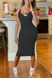 Schwarzes Mode-reizvolles festes rückenfreies O-Ansatz-Riemen-Kleid