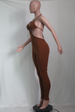 Brown Sexy Solid Hollowed Out Halter Skinny Jumpsuits