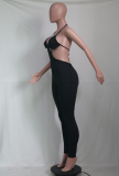 Zwarte sexy effen uitgeholde halter skinny jumpsuits